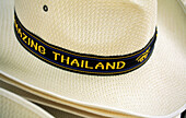 Panama hats on a small boat. Damnoek Saduak Floating Market. Bangkok. Thailand