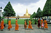 Buddhist monks. Grand Palace. Wat Phra Keo (Emerald Buddha Temple). Bangkok. Thailand