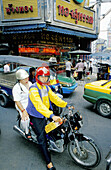 Bikers in the traffic. Bangkok. Thailand