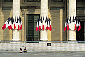 Facade of the Panthéon with flags during national day. Paris. France