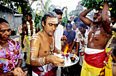Tamil people performing hinduist ritual at St-Gilles-Les Hauts. Reunion Island (France)