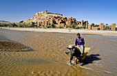 Ait Ben-Haddu Ksar (adobe fortress), river (oued) in spring. South, Ouarzazate region. Morocco.