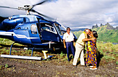 Gaston Flosse President of the Polynesia until february 2005 visiting Hatiteu in helicopter and greeted by Mrs Tata Yvonne local mayor. Nuku-Hiva island. Marquesas archipelago. French Polynesia (MR)