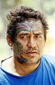 Tattoed sculptor and copra grower portrait. Hiva-Oa island. Marquesas archipelago. French Polynesia (model released)