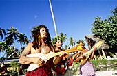 Musicians in a show for supposedly traditionnal weddings in the Tiki Village . Moorea island, close to Tahiti, in the Windward islands. Society archipelago. French Polynesia (MR)