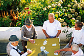 Old men playing cards at Bubión. Alpujarras Mountains area, Granada province. Spain