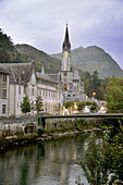 The Gave river and the Basilic at Lourdes. France.