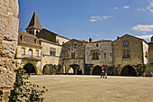 Main square at Monpazier. Dordogne. France.