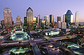 U.S.A. Texas. Dallas. High buildings of the city skyline at dusk, looking east.