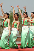 Dancers performing at Chinese Ethnic Cultural Park. Beijing, China