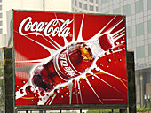 Signs showing new advertising culture and foreign brands. Beijing, China