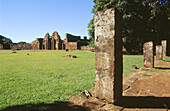Plaza de Armas, Church gate at the rear. Jesuit Mission of San Ignacio Miní ruins. Misiones province. Argentina.