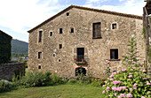 Masia (Catalan typical farmhouse), built in the 12th century with subsequent additions until 18th century. La Garrotxa. Spain
