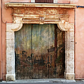 Roussillon village painted entrance portal. Vaucluse, Provence. France.