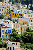 Housing at Yalos harbour, Symi. Dodecanese, Greece