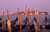 Gondolas and San Giorgio Maggiore. Venice. Italy