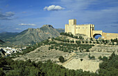 The outstanding Renaissance castle and the village of Vélez Blanco. The castle was built in the early sixteenth century by the Marquises of Vélez Blanco. Province of Almería, Andalucía, Spain.