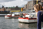 Girl on Norrstroem Harbor (Norrstrom), Stockholm, Sweden