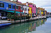 canal with boats and colourful houses in Burano, Venice, Venezia, Italy