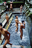 Men bathing near Ubud. Bali Island, Indonesia