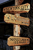 Sign post at the Lazy Bear Lodge in Churchill, Manitoba, Canada.