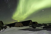 The Northern Lights (Aurora Borealis) in late winter. Churchill, Manitoba, Canada.