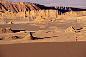 Tourists walking at Valle de La Luna. Atacama desert. Chile