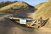 Drifting Sand & Buried Gate.Norfolk. UK