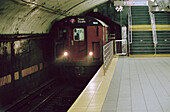 Train leaving subway station