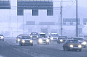 Traffic on a highway in winter.