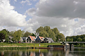 Scenic view of Dutch water landscape with houses. Amsterdam. North Holland.