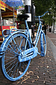 Blue dutch bike. Raadhuistraat, Amsterdam, Netherlands.