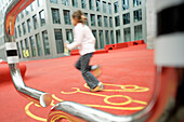Girl running over red carpet, St. Gallen, Canton of St. Gallen, Switzerland