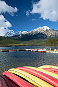 Rental boats at Pyramid Lake and Pyramid Mountain (2762 m) in background. Jasper National Park. Alberta, Canada