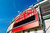 Wrigley Field, home of the Chicago Cubs baseball team, stadium sign. Wrigleyville, Chicago. Illinois, USA