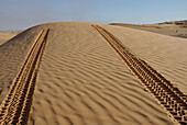 Car tracks in the sand, Offroad 4x4 Sahara Desert Tour, Bebel Tembain area, Sahara, Tunisia, Africa