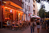Berlin Friedrichshain,  Simon Dach street, street cafes restaurants bars, young  people