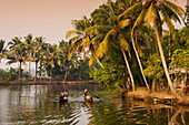 India Kerala  backwaters indian people in canoe