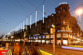 Switzerland, Zurich, Bahnhofstrasse at  twilight . Chistmas illumination , Hotel Schweizer Hof