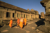 Monks at the temple complex of Angkor Wat. Angkor. Cambodia