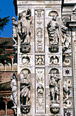 Relief on the façade of the church of La Certosa di Pavia (Carthusian monastery). Lombardy, Italy