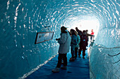 Le Montenvers. Winter. Mer de Glace Glacier Ice Cave. Visitors. Chamonix. Mont-Blanc. Haute-Savoie. French Alps. France.