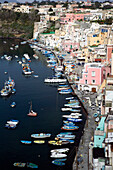 Town view of Corricella port. Procida. Bay of Naples. Campania. Italy.