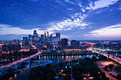 Evening city skyline scene from St. Anthony Main. Minneapolis. Minnesota. USA.