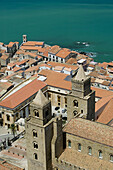 Town Overview with 13th century Duomo from La Rocca Mountain, Cefalu. Sicily, Italy
