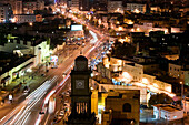 Morocco-Casablanca: Aerial View of Avenue des FAR & Ancienne Medina Clock Tower / Evening
