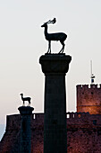 Stag Column (Symbol of Rhodes). Mandraki Harbor. Dawn. Rhodes. Dodecanese, Greece