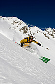 Skier freeriding, Gemsstock skiing region, Andermatt, Canton Uri, Switzerland