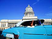 Cuba, Havana, Capitol. Old American car