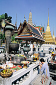 Offerings inside the buddhist temple oh Wat Phra Keo.Bangkok. Thailand